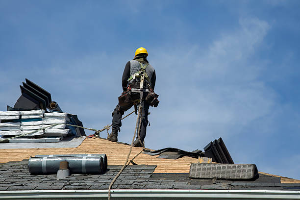 Professional Roofing technician working in Peru, IN